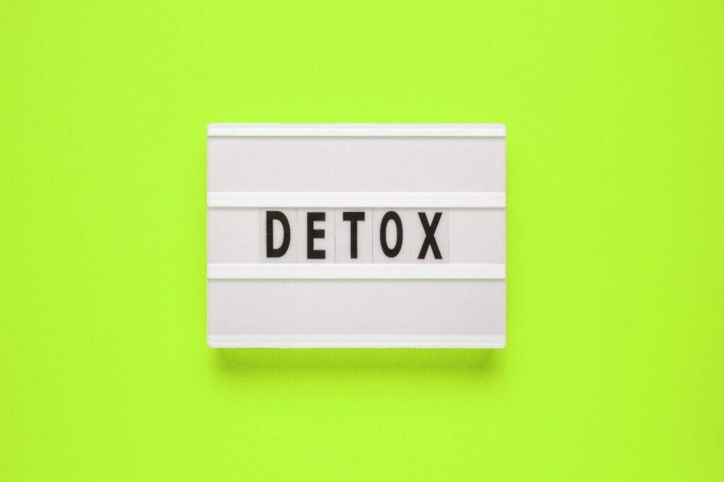 "Detox spelled out against a lime background